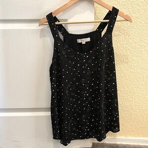 Black blouse with white star pattern, worn only a few times!